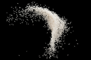 Stop motion white rice splash or explode flying in the air  isolated on black background food...