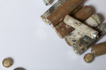 The fulfilled batteries of the different size covered with corrosion. Recycling.
