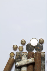 The fulfilled batteries of the different size covered with corrosion. Recycling.