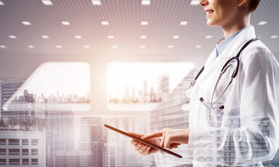 Successful doctor and modern technologies.
