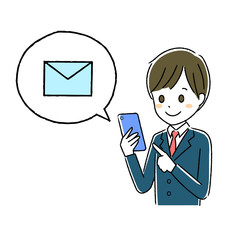 スマホを操作する男子学生