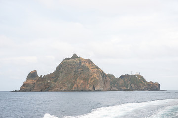 Dokdo island where is beside Ulleungdo island is one of the famous tourist site where is made by volcano. There are varous oddly formed rocks and strangely shaped stones, and clean air in the East sea