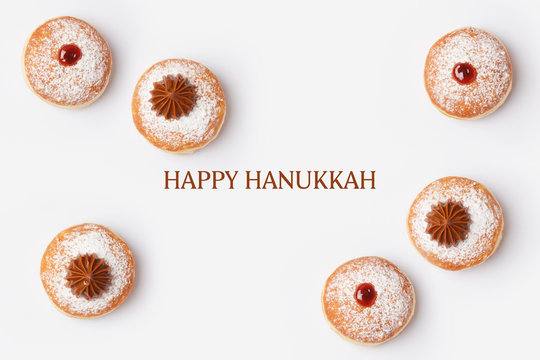 Jewish holiday Hanukkah sufganiyot on white background