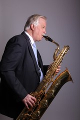 Mature man with a saxophone