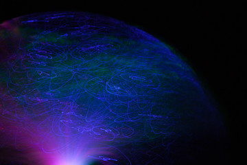 Abstract background a Optical fiber lamp. Closeup of colorful optical fibers