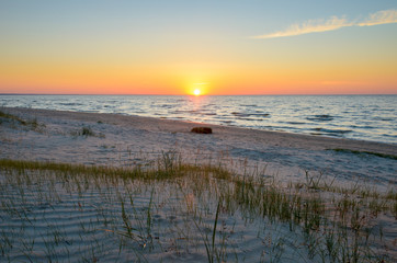 Colorful sunset on the Baltic sea coast. Latvia. - 225064362