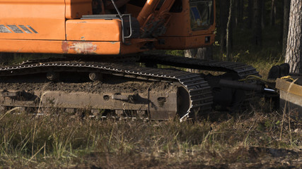 Fototapeta na wymiar Machine on the logging site