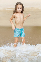 little boy in the sea in Thailand