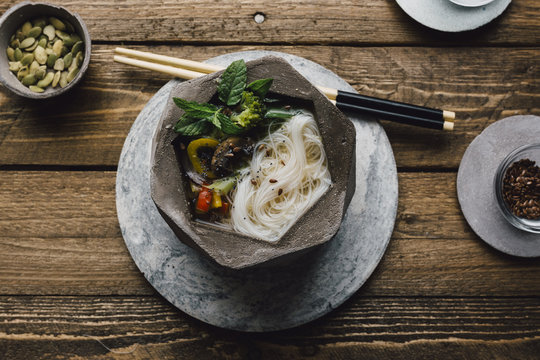 Bowl of Asian Noodle Soup with chopsticks