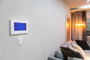 Home interior with a smart home control console or air conditioning setting - remote control