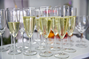 Glasses with champagne close-up, bubbles of champagne