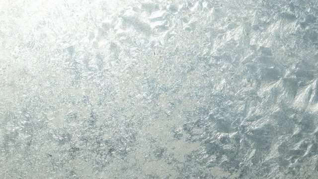 Window frost, ice flowers, background