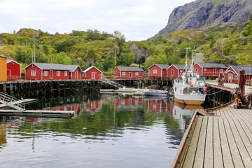Naklejka premium Wanderlust in Nusfjord fishing village in Lofoten, Northern Norway
