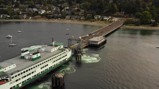 Cinematic footage of a ferry at terminal dock Seattle Washington