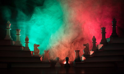 Business hierarchy. Strategy concept with chess pieces. Chess standing on a pyramid of wooden...