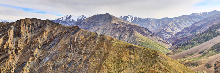 Beautiful panoramic view of snow capped Himalaya mountains from Manali Leh Highway in India.