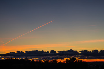 sunset with aircraft