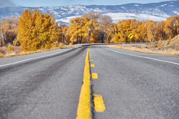Highway at autumn in Colorado, USA.