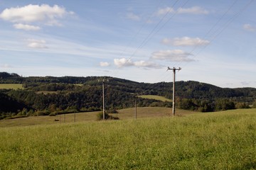 Fototapeta premium Pylon high voltage power lines, wires leading electrical current.