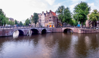Obraz premium Bridge over Keizersgracht - Emperor's canal in Amsterdam, The Netherlands at twilight.