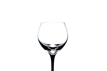 Empty wineglass close-up isolated on a white background