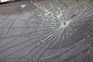 broken tempered glass closeup , background of glass was smashed close up