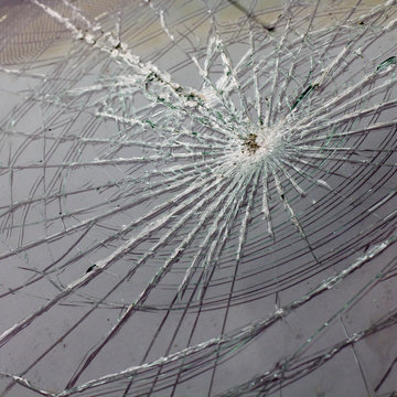 broken tempered glass closeup , background of glass was smashed close up