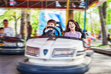 Children driving bumper cars in the Amusement Park