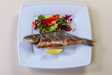 Grilled seabass with lemon