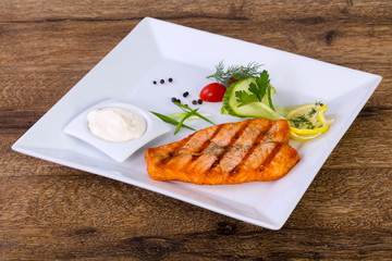Grilled salmon with sauce