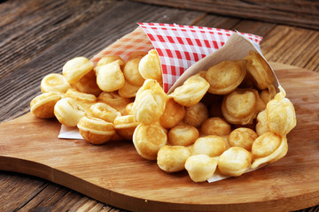 Hong Kong style egg waffle on wooden board. bubble waffle