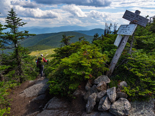 Hiker on Appalachian Trail in Maine, Lush Mountain Vista, Wooden Trail Sign