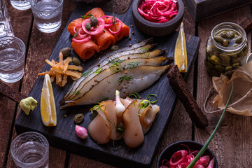 Fish appetizer for vodka shots, close view