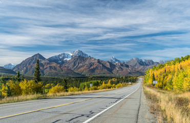 Empty road through Alaskan wildernes
