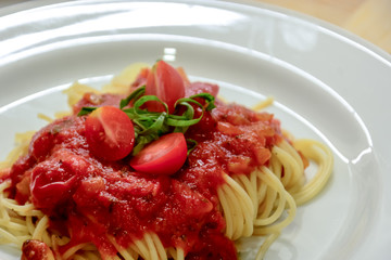 Tasty noodles with cherry tomatos and herbs