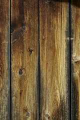 Fototapeta premium Von der Sonne getönte Holzwand