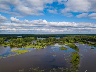 Aerial view of river Nemda with green riverside and islands. Summer 2018, Russia