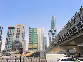 Fototapeta na wymiar Metro and air-conditioned walkway above the main street in Dubai.
