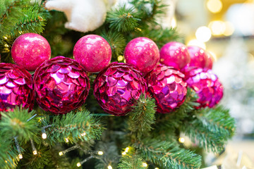 Closeup on Christmas tree decoration over festive background