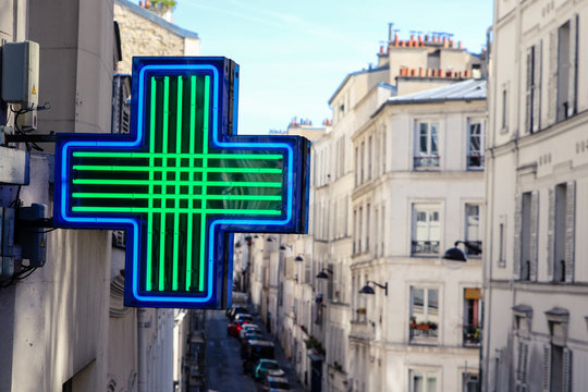 Medical cross of pharmacy in Paris Montmartre