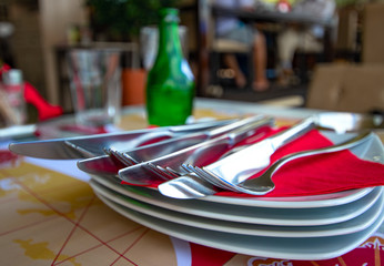 Waiting for a dinner, close-up of table setting with cutlery