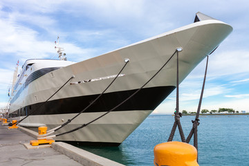 Large yacht tied to the dock on the shore of Lake Michigan