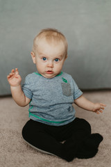 Fototapeta premium Cute Adorable Little Baby Boy Having Fun During a Photoshoot