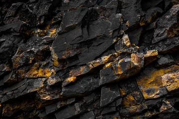 Tissu par mètre Pierres fond noir de roche avec la couleur d& 39 or/jaune
