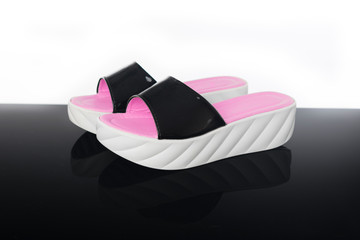 double thick heels women's slippers on black reflective background