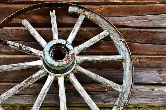 Old Wooden Wagon Wheel Close Up