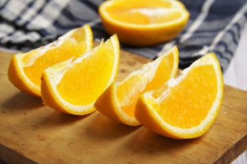 Naklejka na ściany i meble Sliced orange fruits