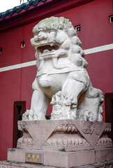 Chinese lion sculpture as the guardian in Chinese temple