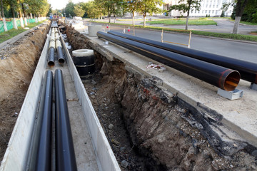 Replacement pipes in the city.Construction of heating mains for municipal infrastructure, the...