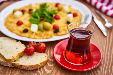 Mediterranean Breakfast with Tea, Omelette and Bread